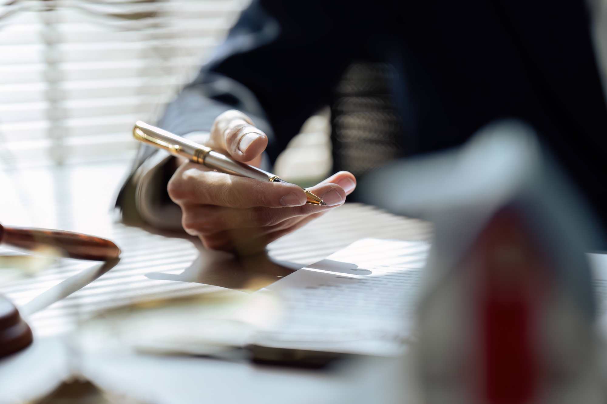 Corporate commercial lawyer analyzing documents